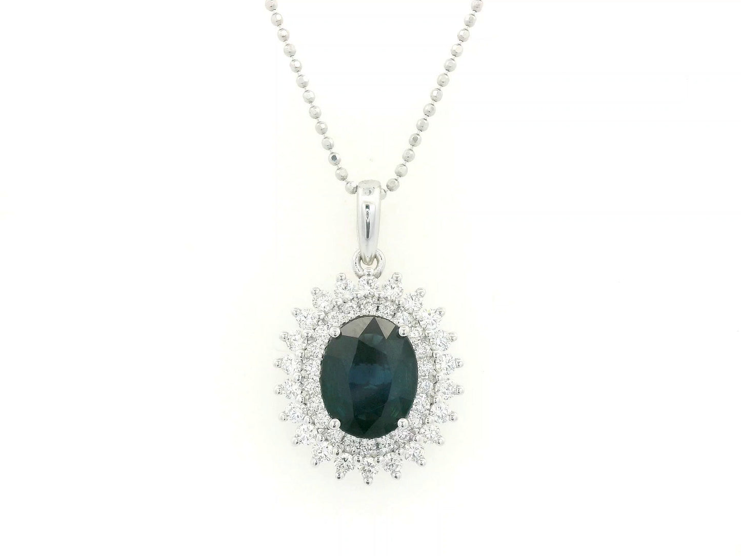18K white gold sapphire and diamond halo pendant with oval sapphire – Emirates Diamonds