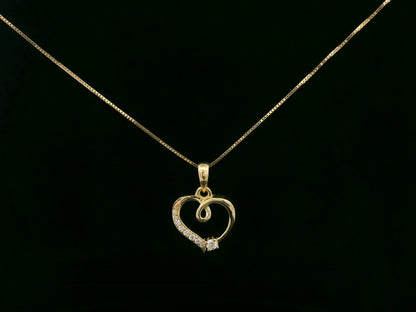 18K yellow gold diamond heart pendant with delicate open-heart design by Emirates Diamonds.