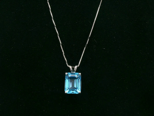 18K white gold Swiss blue topaz emerald cut pendant, Emirates Diamonds