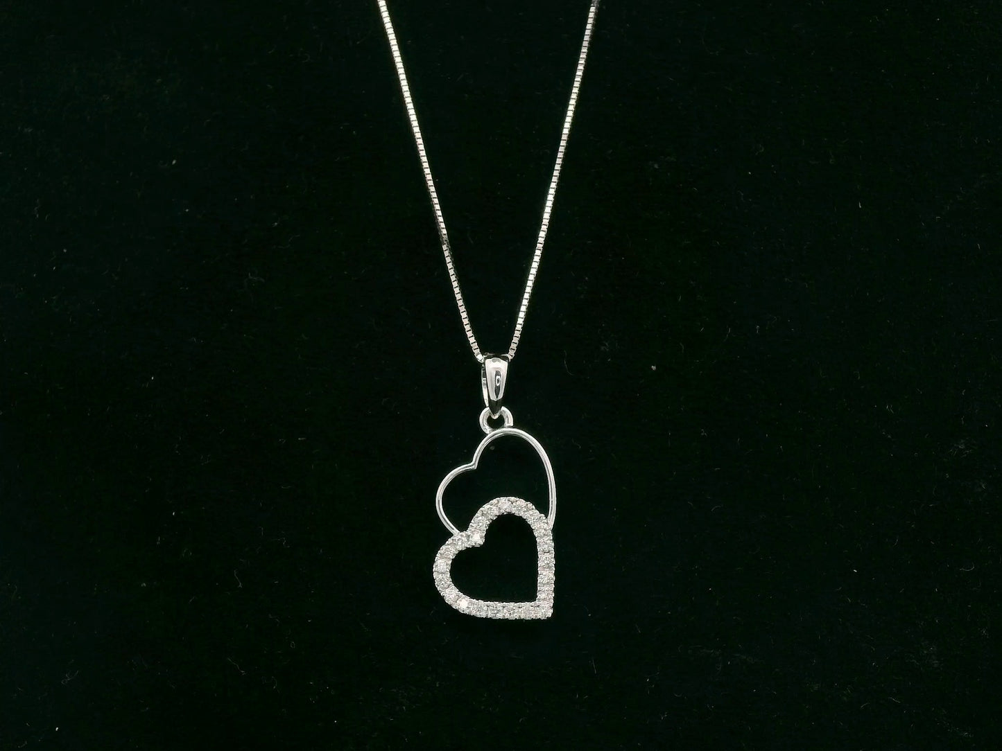 18K white gold double heart diamond pendant necklace with pavé diamonds – fine jewelry by Emirates Diamonds