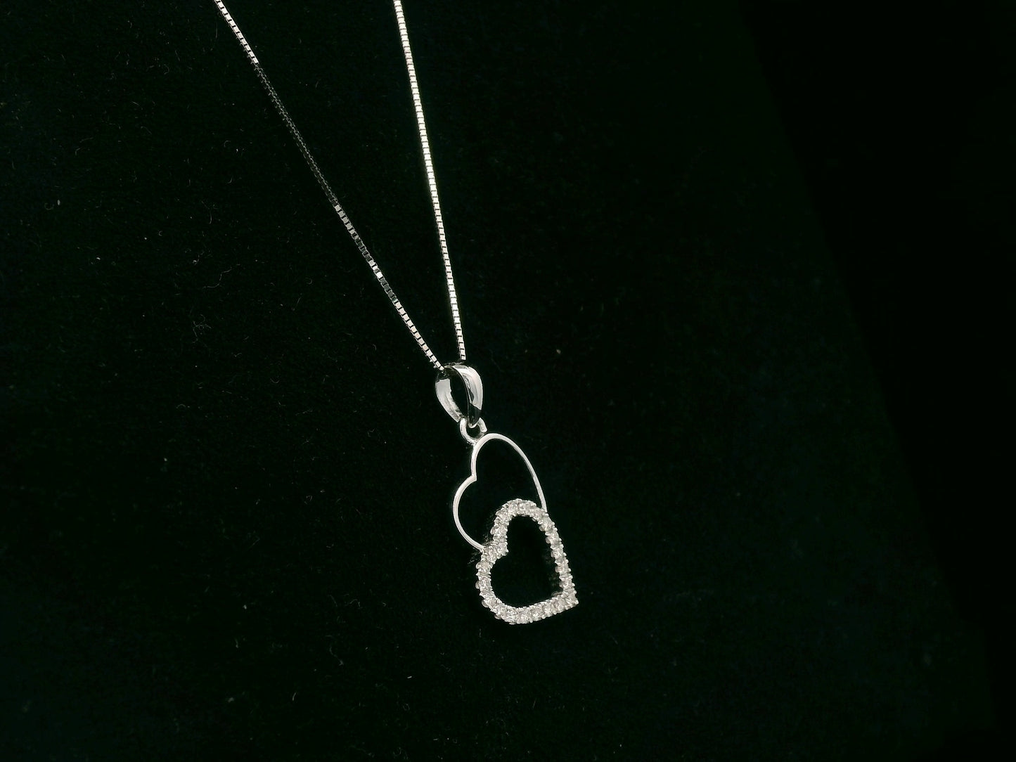 18K white gold double heart diamond pendant necklace with pavé diamonds – fine jewelry by Emirates Diamonds