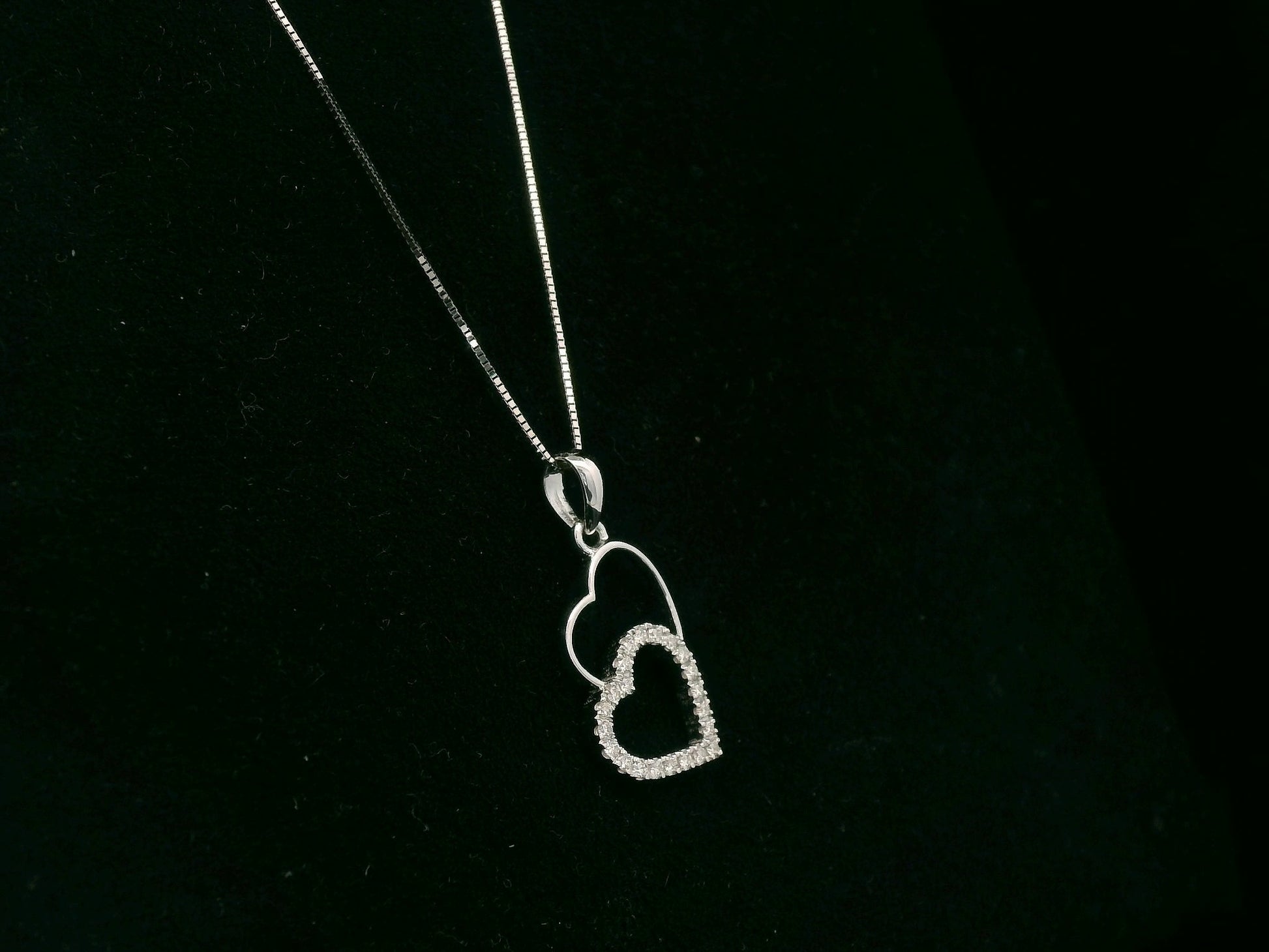 18K white gold double heart diamond pendant necklace with pavé diamonds – fine jewelry by Emirates Diamonds