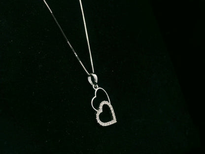 18K white gold double heart diamond pendant necklace with pavé diamonds – fine jewelry by Emirates Diamonds