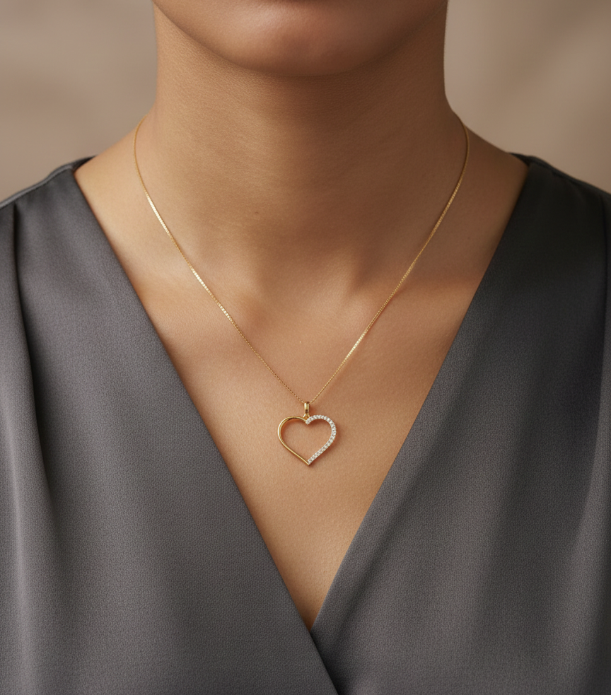 18K yellow gold open heart pendant with 0.15 carat natural diamonds by Emirates Diamonds