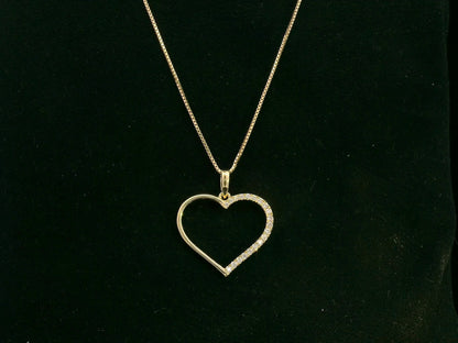 18K yellow gold open heart pendant with 0.15 carat natural diamonds by Emirates Diamonds