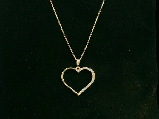 18K yellow gold open heart pendant with 0.15 carat natural diamonds by Emirates Diamonds