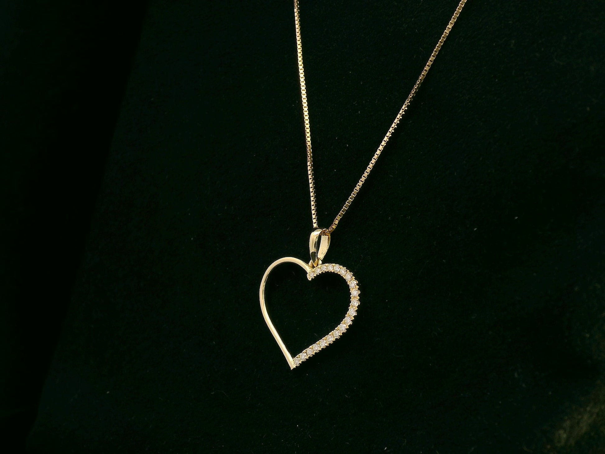 18K yellow gold open heart pendant with 0.15 carat natural diamonds by Emirates Diamonds