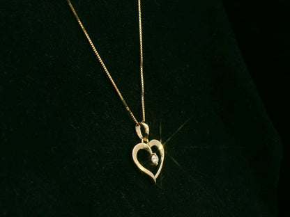 18K yellow gold open heart diamond pendant by Emirates Diamonds