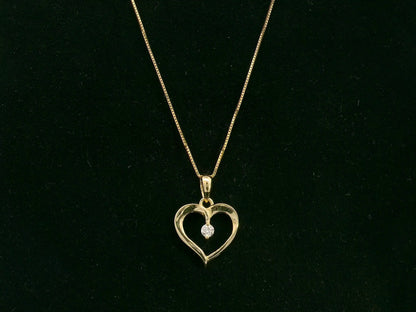 18K yellow gold open heart diamond pendant by Emirates Diamonds