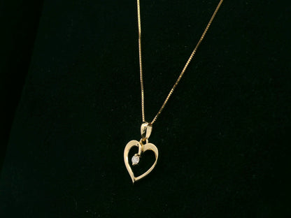 18K yellow gold open heart diamond pendant by Emirates Diamonds