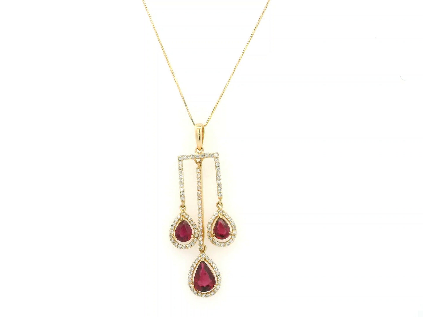 18K yellow gold ruby drop pendant with pear-cut rubies and diamond halo detailing by Emirates Diamonds