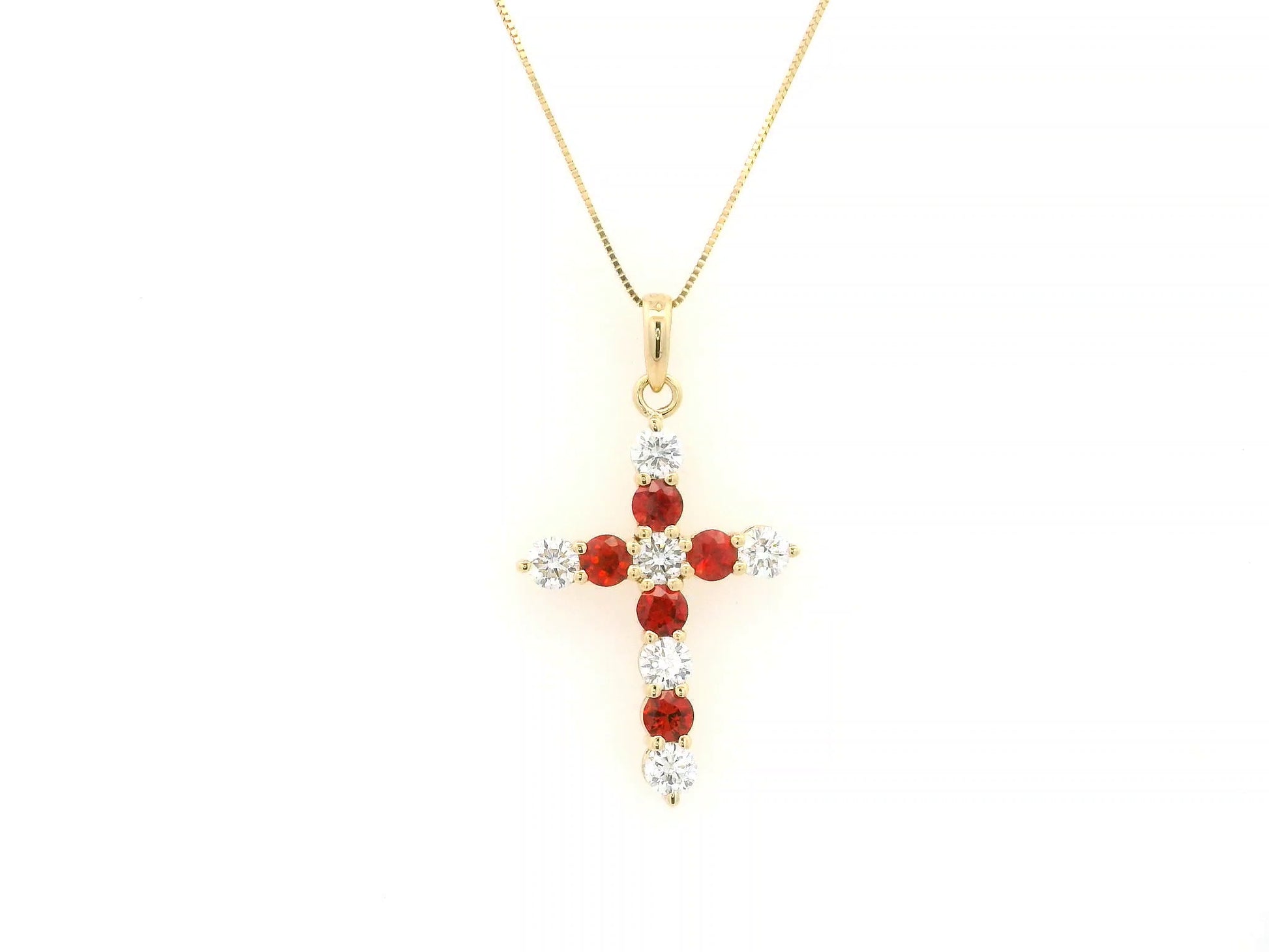 18K yellow gold cross pendant with round orange sapphires and diamonds by Emirates Diamonds
