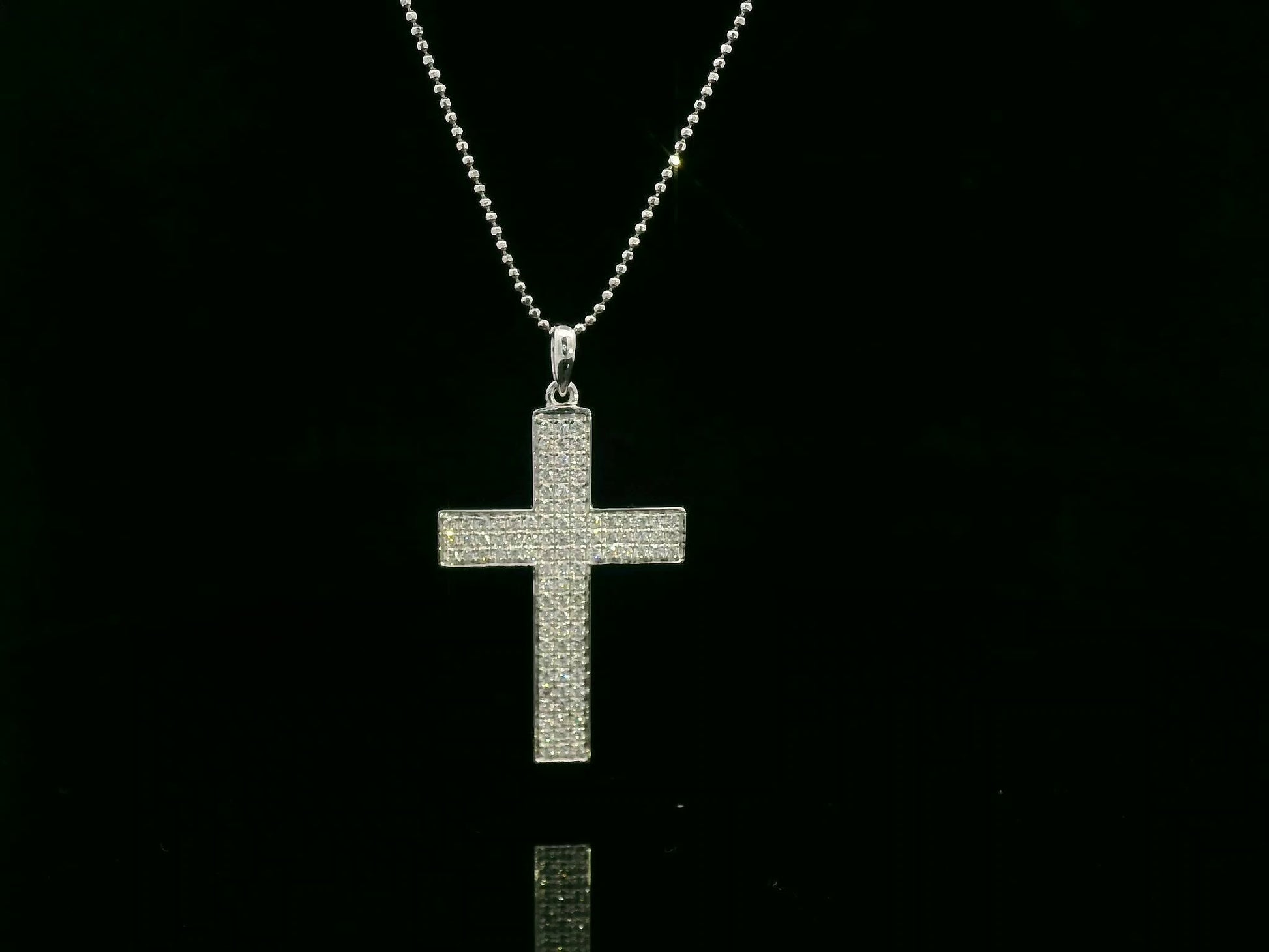 0.80 carat diamond cross pendant in 18K white gold pavé set by Emirates Diamonds