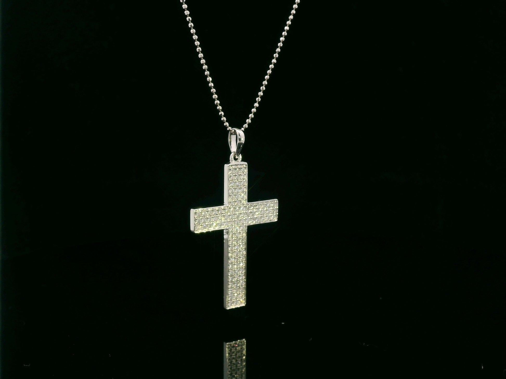 0.80 carat diamond cross pendant in 18K white gold pavé set by Emirates Diamonds