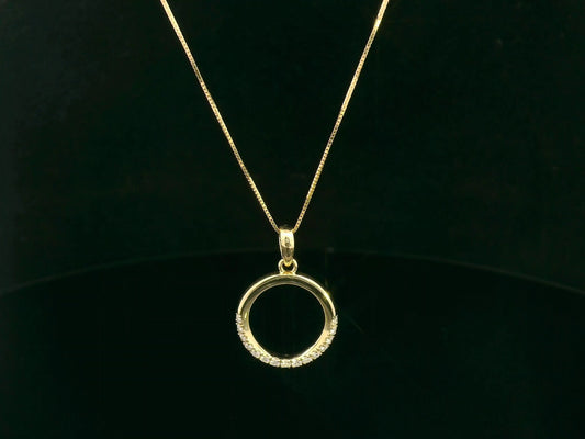 18K yellow gold diamond circle pendant with pavé-set diamonds in an open eternity design by Emirates Diamonds.