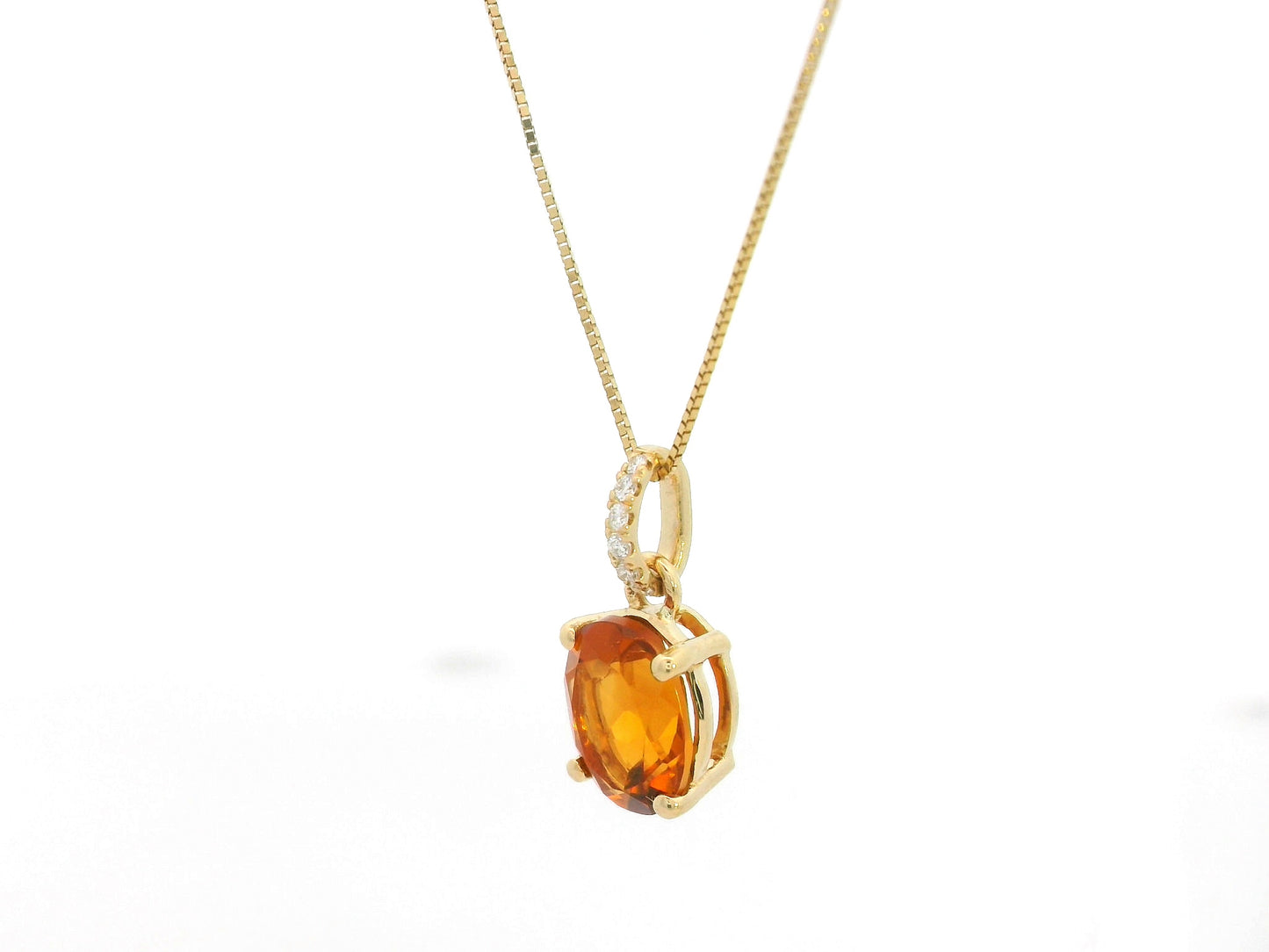 1.53 carat oval citrine and diamond pendant in 18K yellow gold by Emirates Diamonds