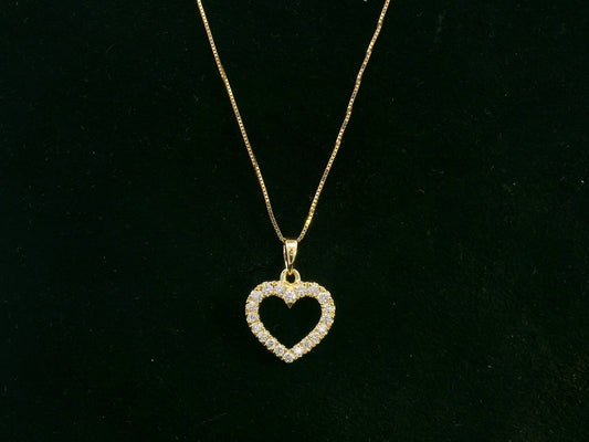 18K yellow gold diamond heart pendant with pavé-set diamonds, elegant open heart design by Emirates Diamonds.