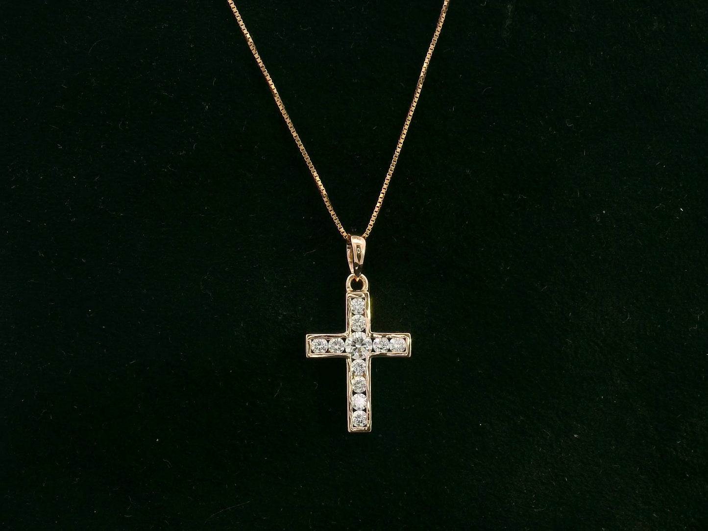 Diamond cross pendant in 18K rose gold with prong-set natural diamonds by Emirates Diamonds