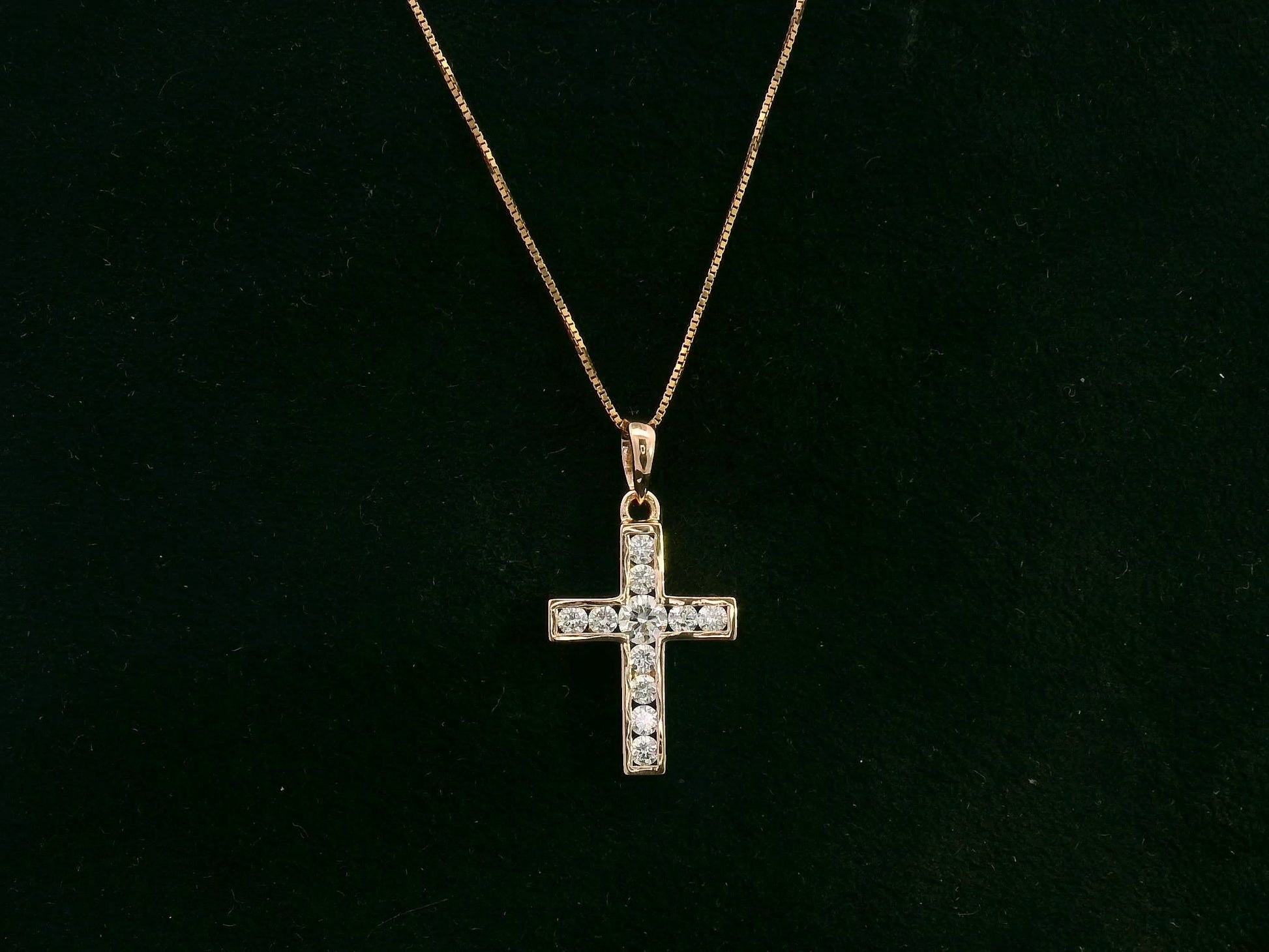 Diamond cross pendant in 18K rose gold with prong-set natural diamonds by Emirates Diamonds