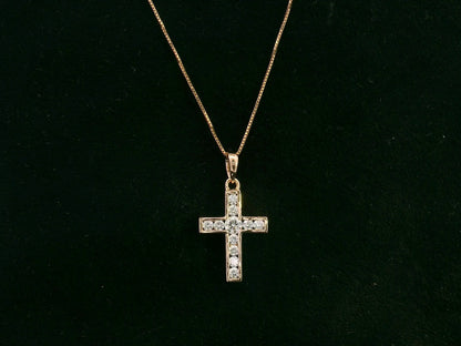Diamond cross pendant in 18K rose gold with prong-set natural diamonds by Emirates Diamonds