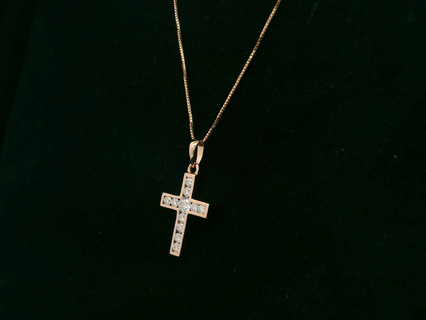 Diamond cross pendant in 18K rose gold with prong-set natural diamonds by Emirates Diamonds