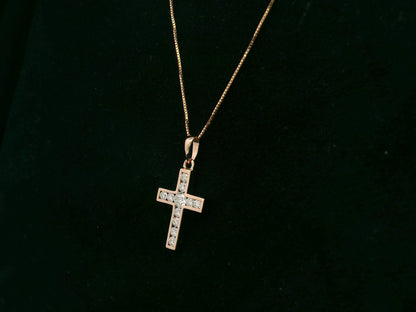 Diamond cross pendant in 18K rose gold with prong-set natural diamonds by Emirates Diamonds