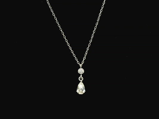 Diamond drop pendant necklace with pear shaped diamond in 18K white gold by Emirates Diamonds