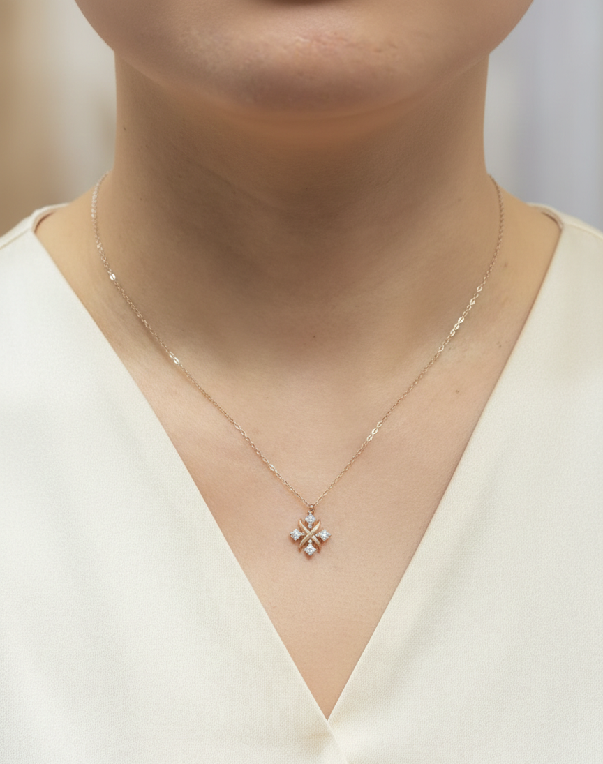 Two-tone diamond pendant necklace in 18K white and rose gold with 0.25 carats of natural diamonds by Emirates Diamonds