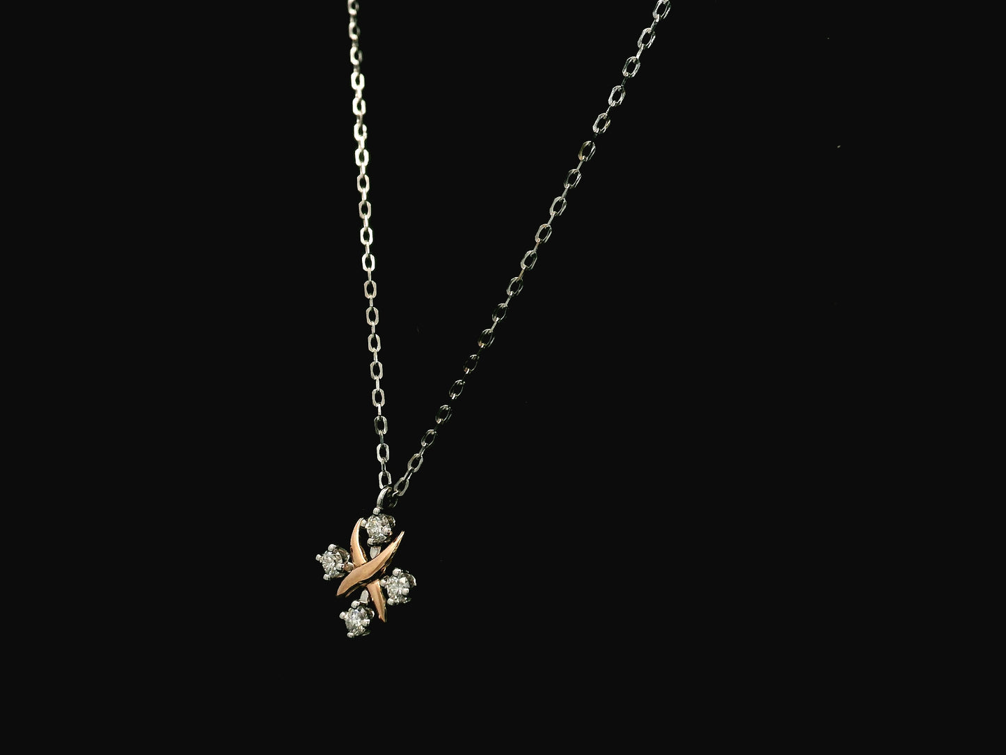 Two-tone diamond pendant necklace in 18K white and rose gold with 0.25 carats of natural diamonds by Emirates Diamonds