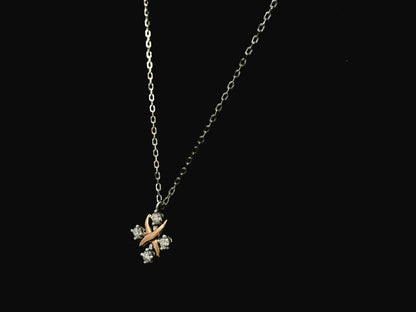 Two-tone diamond pendant necklace in 18K white and rose gold with 0.25 carats of natural diamonds by Emirates Diamonds
