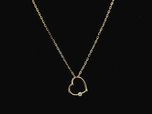 Diamond heart pendant necklace in 18K yellow gold with natural diamond by Emirates Diamonds