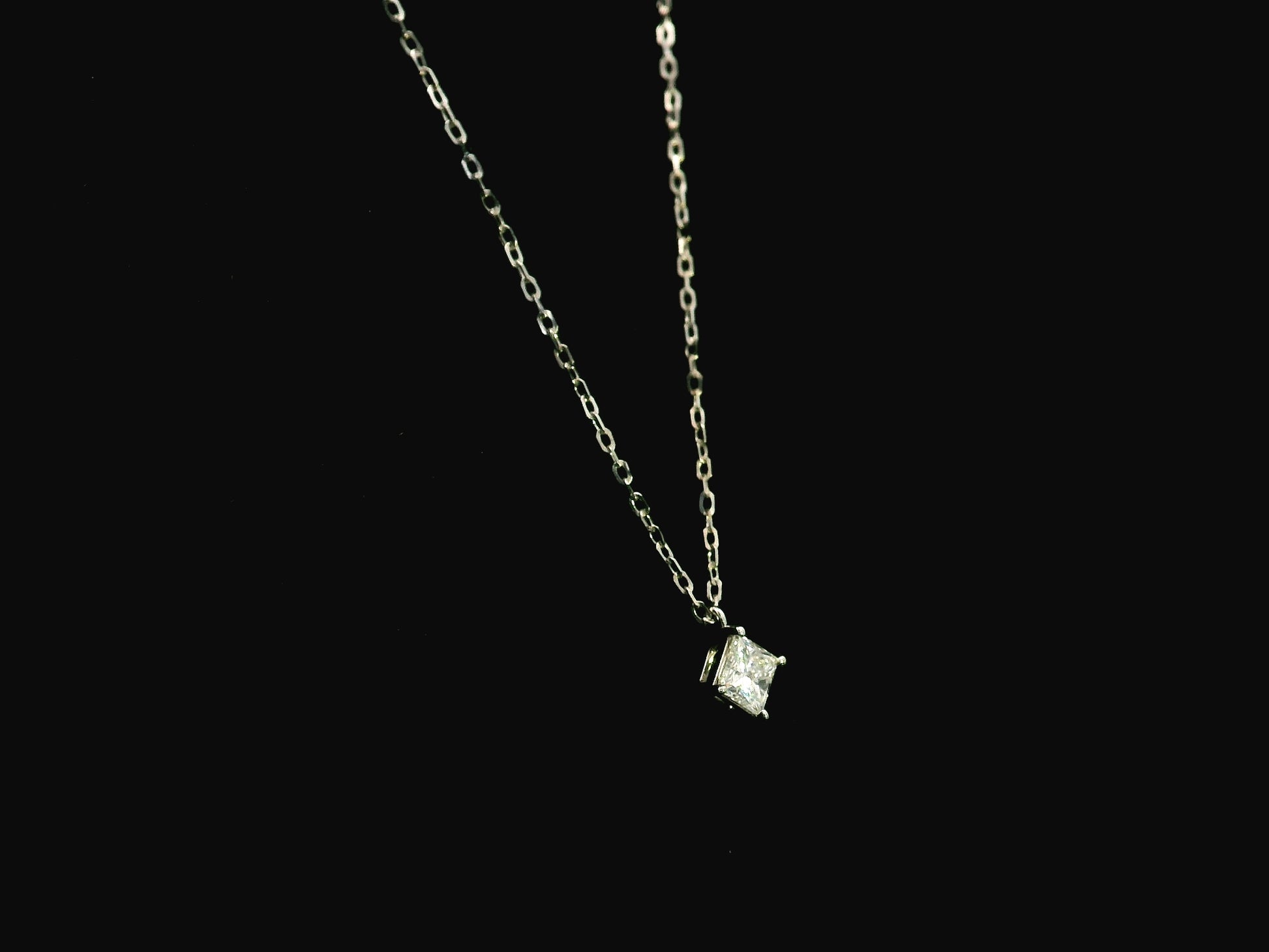 Princess cut diamond solitaire pendant 0.50 carat GIA certified in 18K white gold by Emirates Diamonds