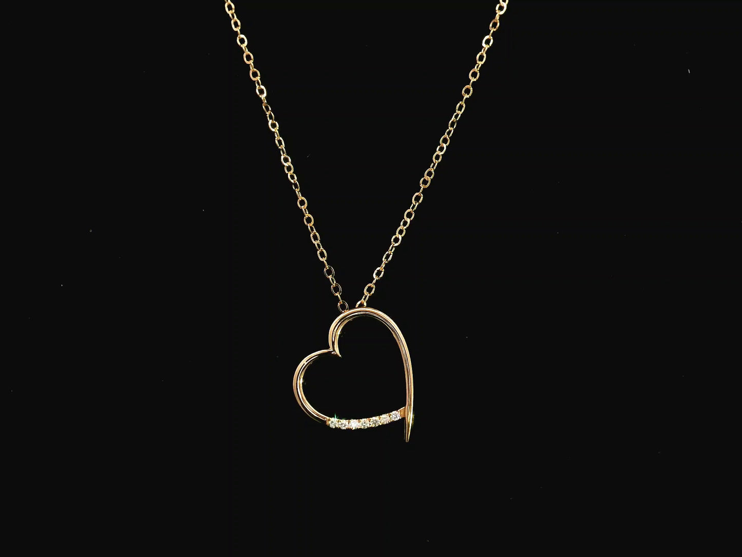Diamond heart pendant necklace in 18K yellow gold with chain by Emirates Diamonds