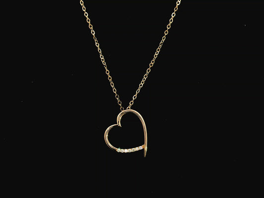 Diamond heart pendant necklace in 18K yellow gold with chain by Emirates Diamonds
