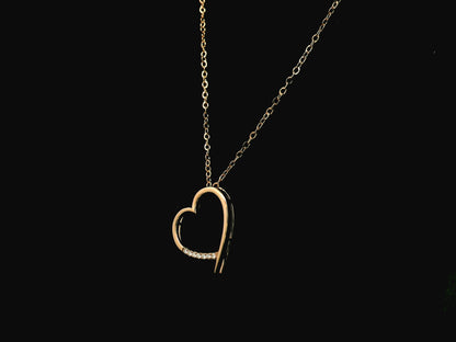 Diamond heart pendant necklace in 18K yellow gold with chain by Emirates Diamonds