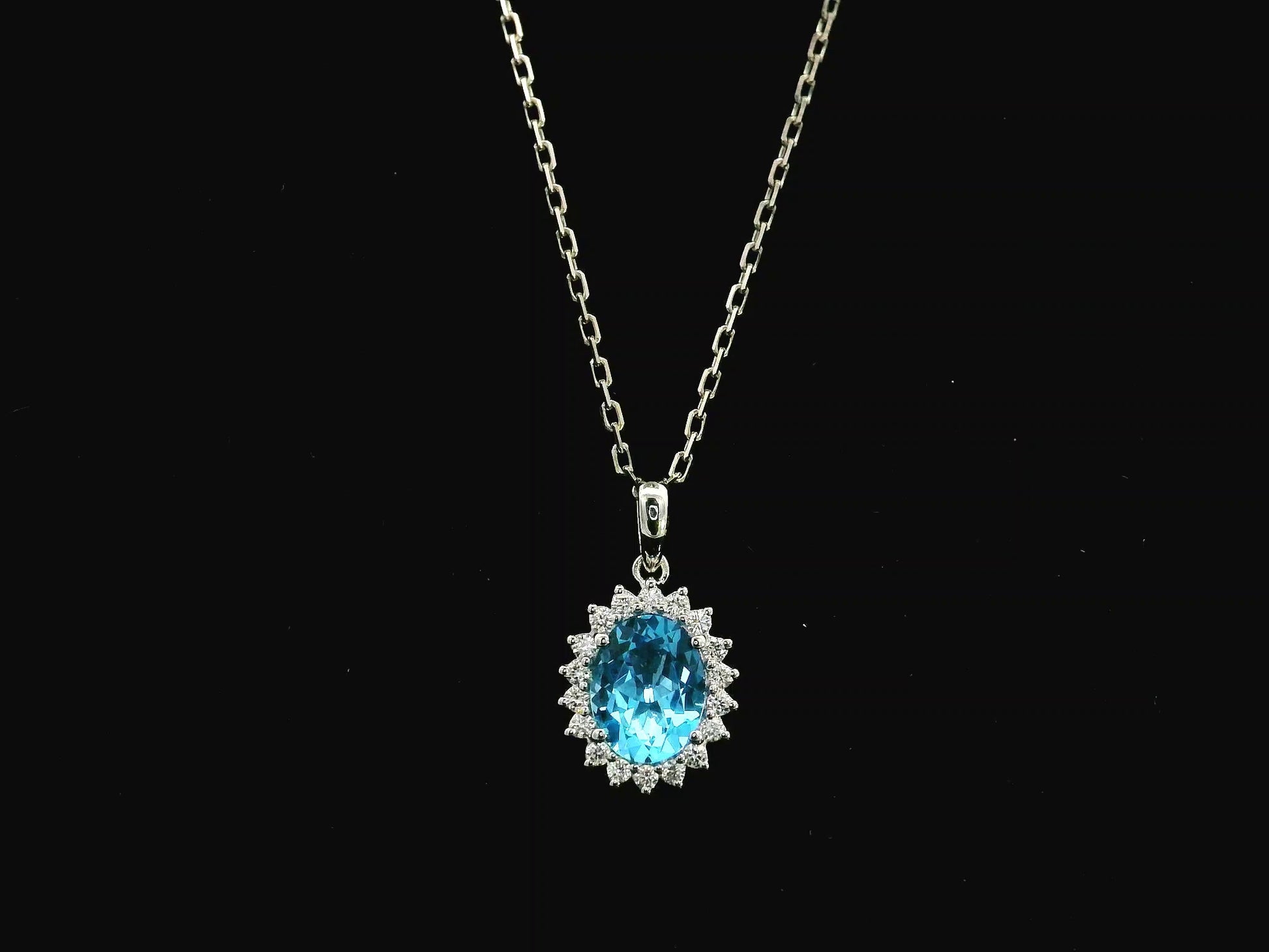 Swiss blue topaz and diamond halo pendant in 18K white gold – Emirates Diamonds