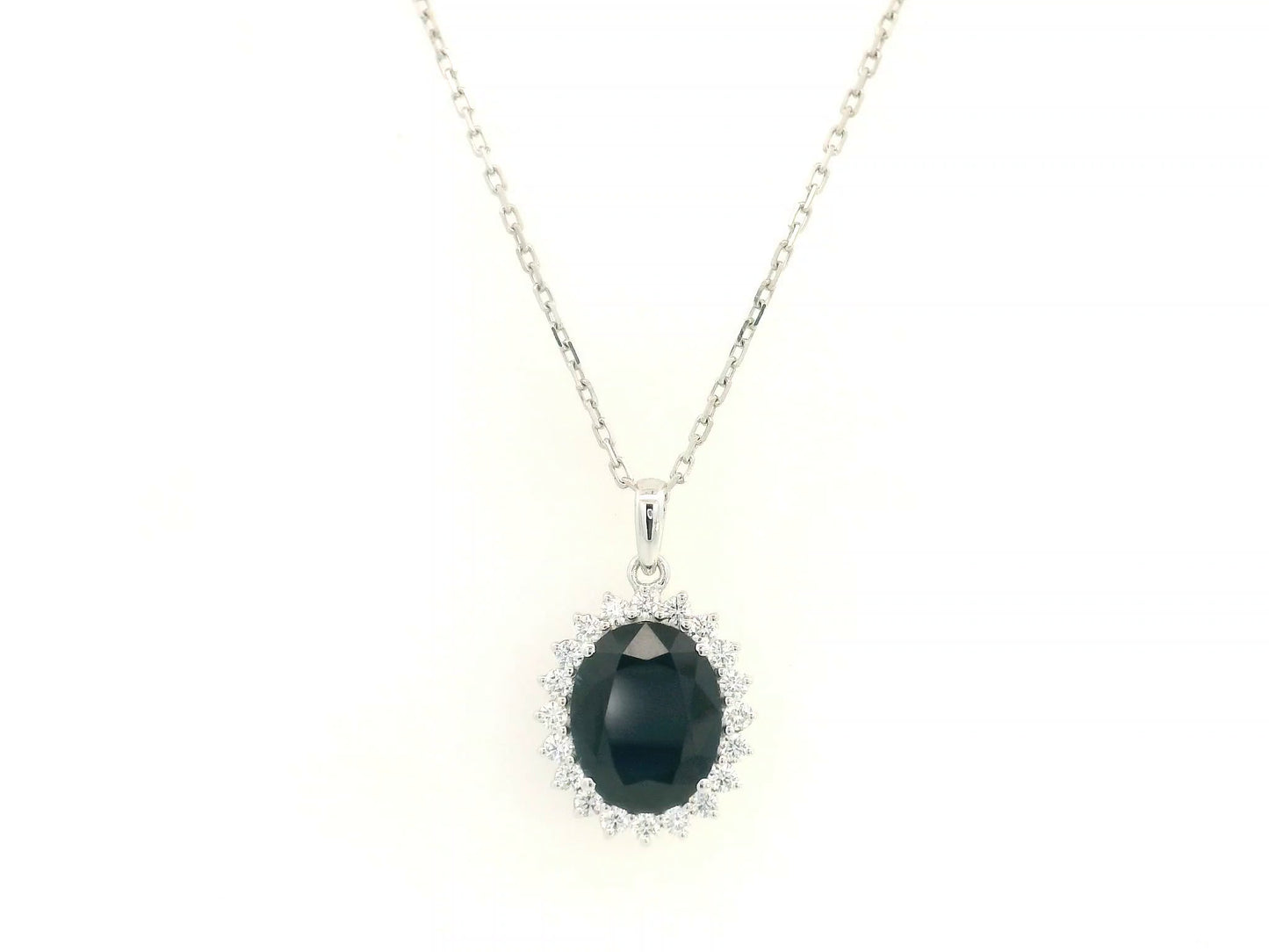 Blue Sapphire & Diamond Halo Pendant in 18K White Gold