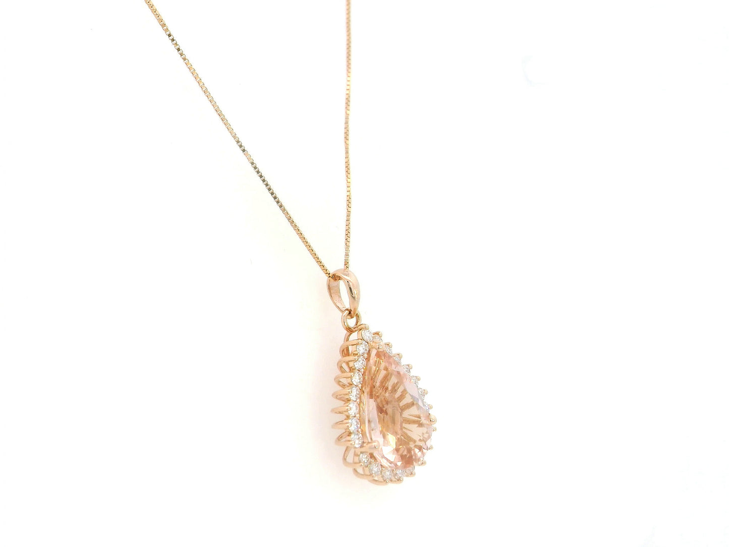 Morganite diamond pendant in 18K rose gold pear-shaped halo pendant – Emirates Diamonds