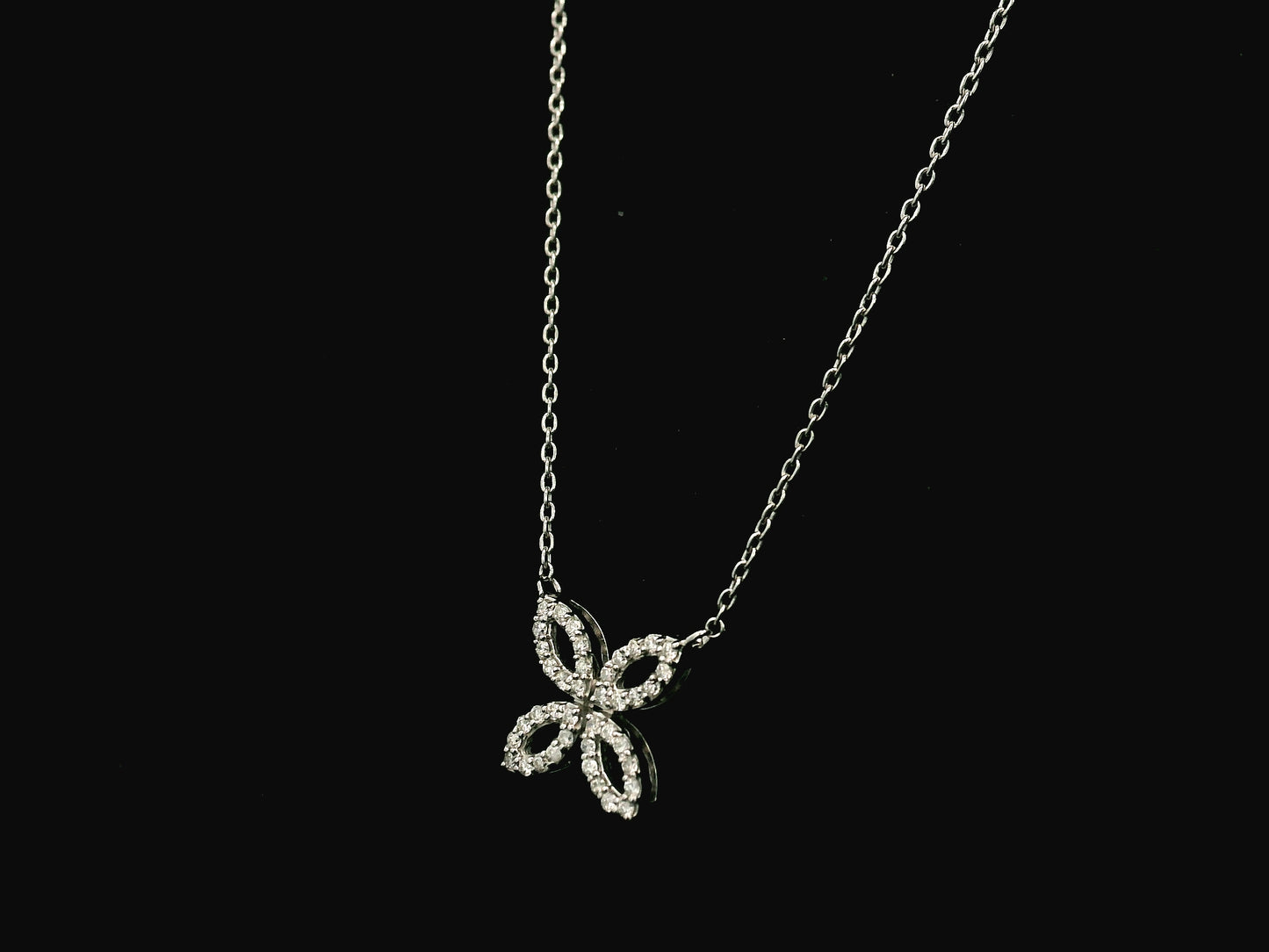 Diamond floral necklace in 18K white gold with four-petal marquise design – Emirates Diamonds