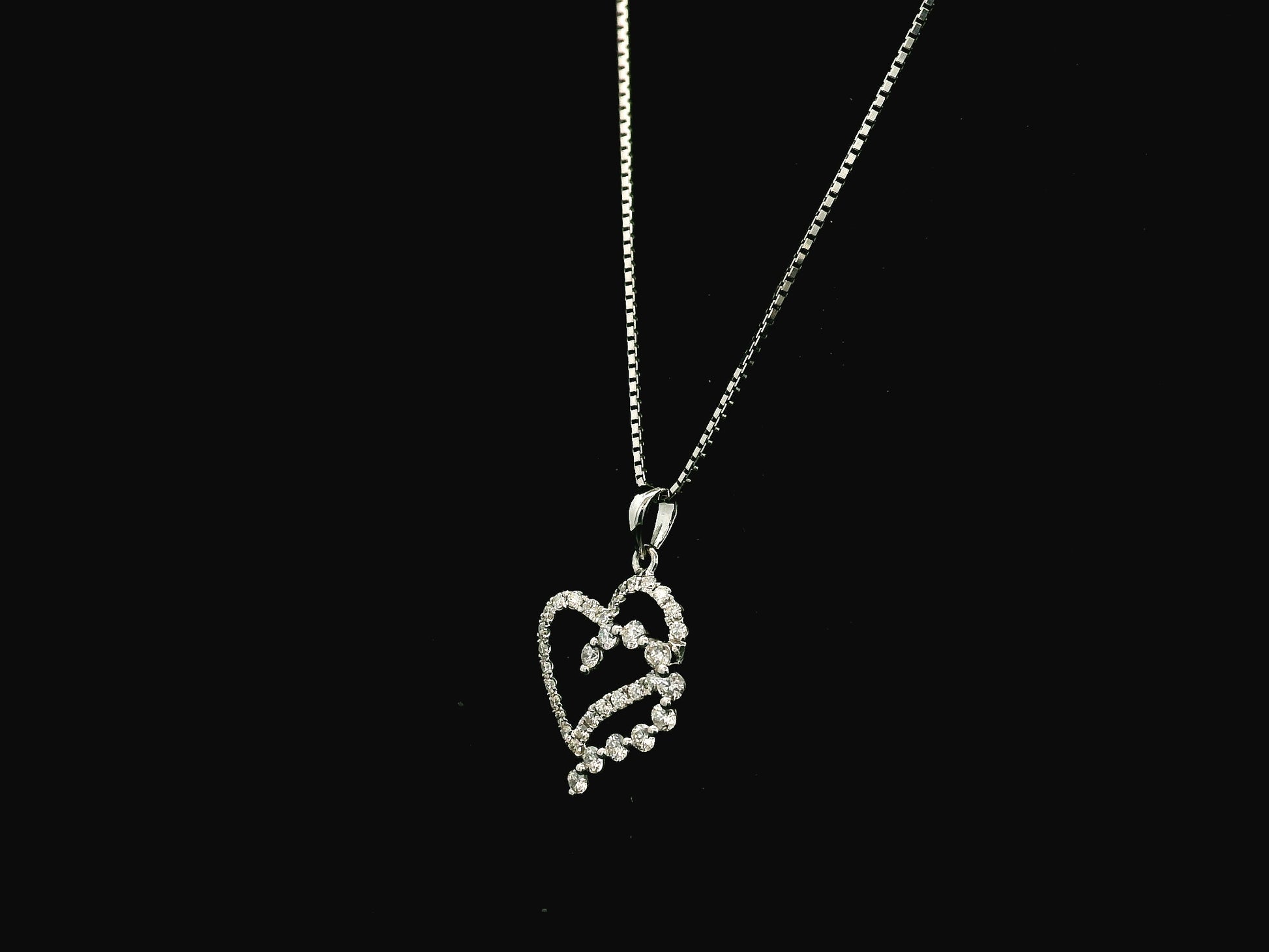 18K white gold diamond heart pendant with cascading design 0.45 carat