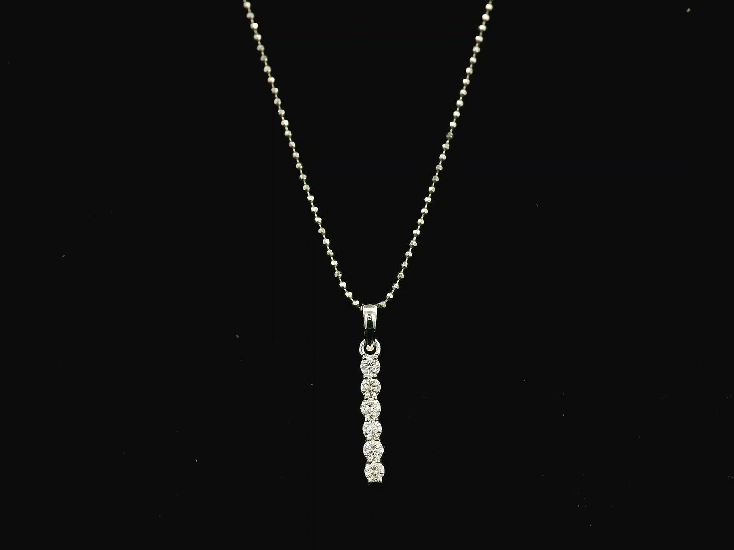 18K white gold vertical diamond bar pendant with 0.25 carat natural diamonds by Emirates Diamonds