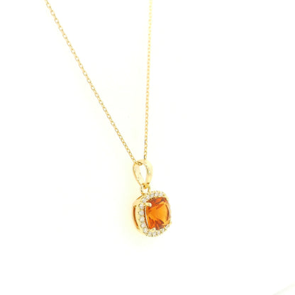 Citrine and diamond halo pendant in 18K yellow gold with cushion-cut citrine gemstone