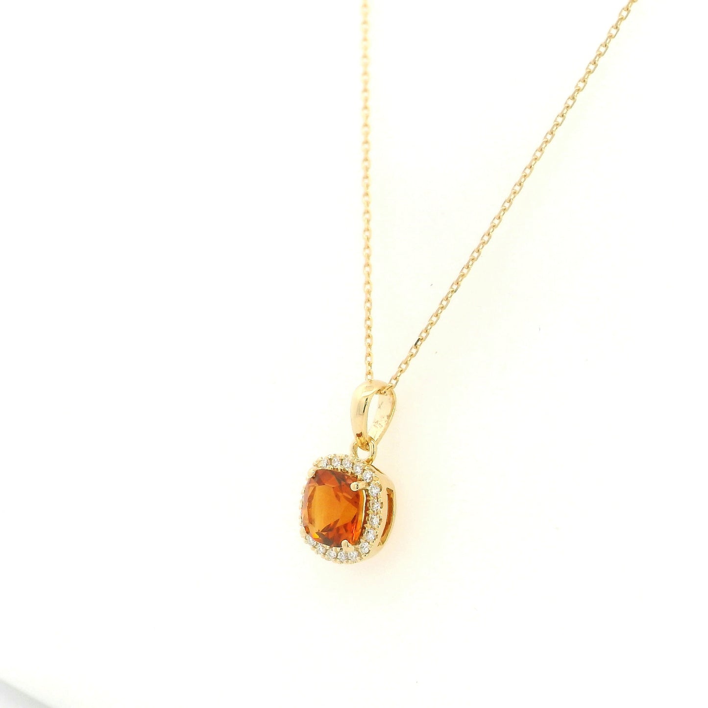 Citrine and diamond halo pendant in 18K yellow gold with cushion-cut citrine gemstone