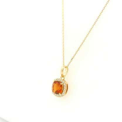 Citrine and diamond halo pendant in 18K yellow gold with cushion-cut citrine gemstone