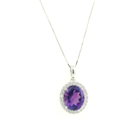 18K white gold amethyst and diamond halo pendant with oval purple gemstone