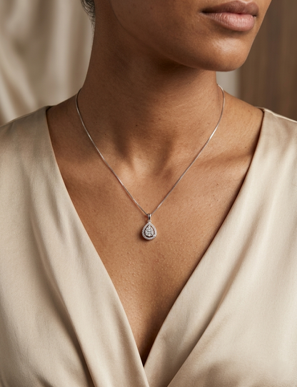 18K white gold pear shape diamond halo pendant with cluster center