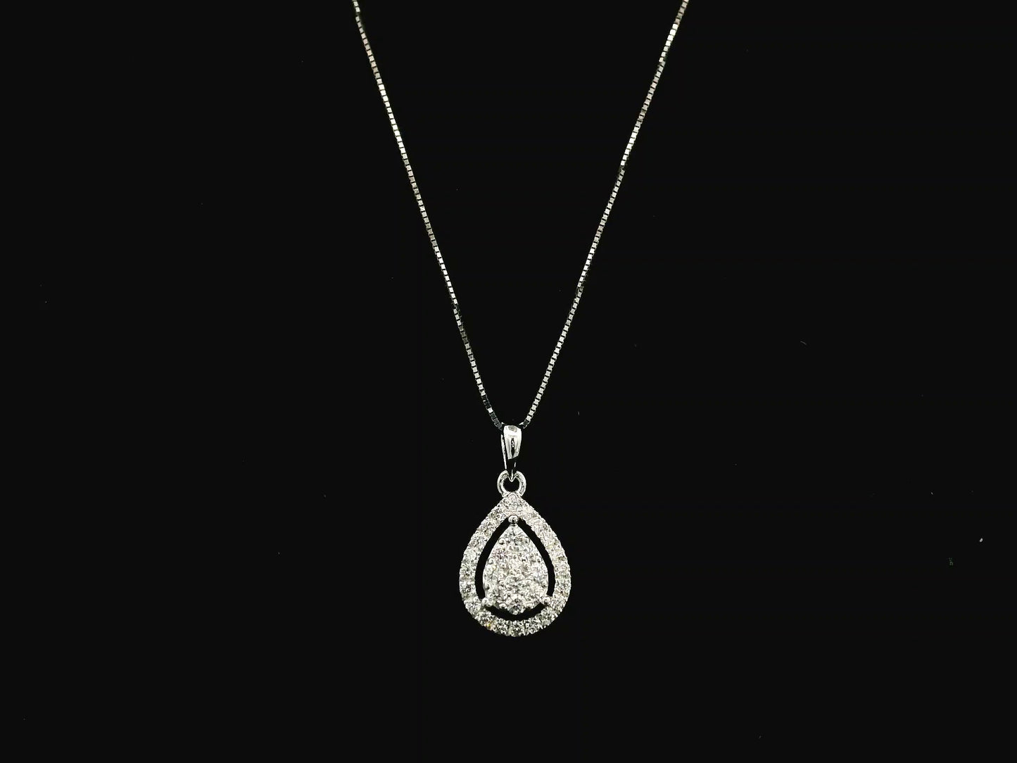 18K white gold pear shape diamond halo pendant with cluster center