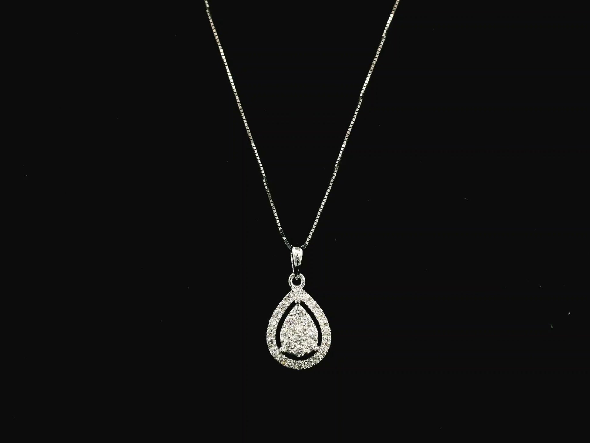 18K white gold pear shape diamond halo pendant with cluster center