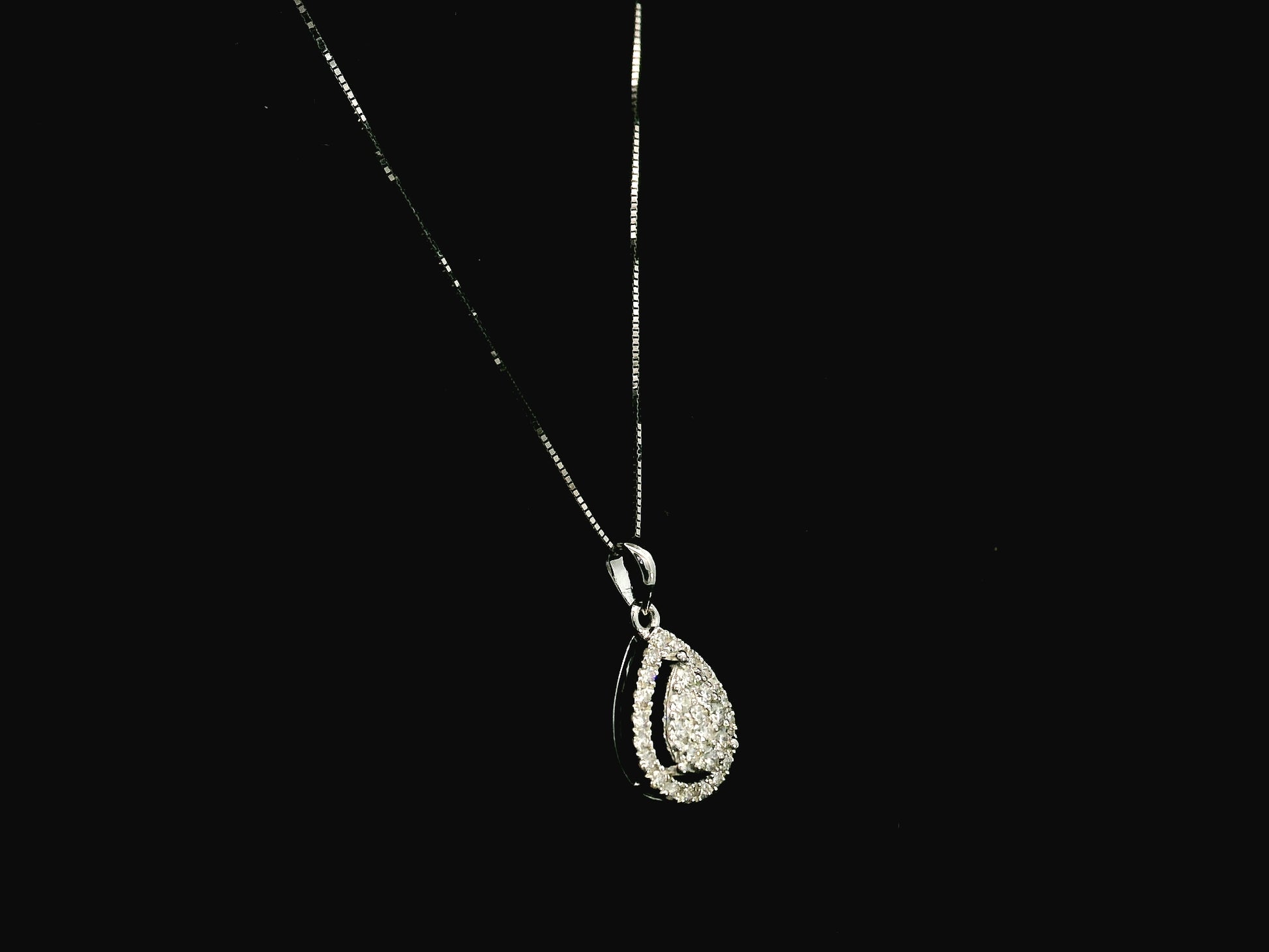 18K white gold pear shape diamond halo pendant with cluster center