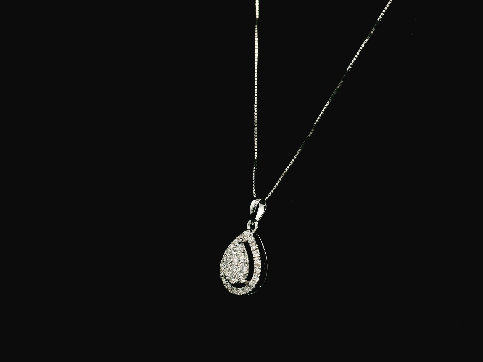 18K white gold pear shape diamond halo pendant with cluster center